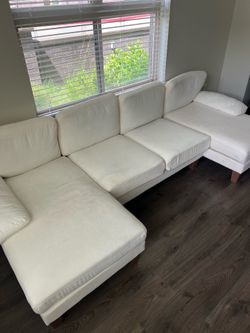 White U shaped couch