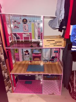 Barbie house, RV, and ambulance