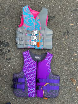 (2) WEST MARINE Women’s life vests .