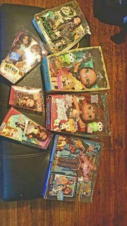 Collectible Bratzs set and a barbie with DVD $375
