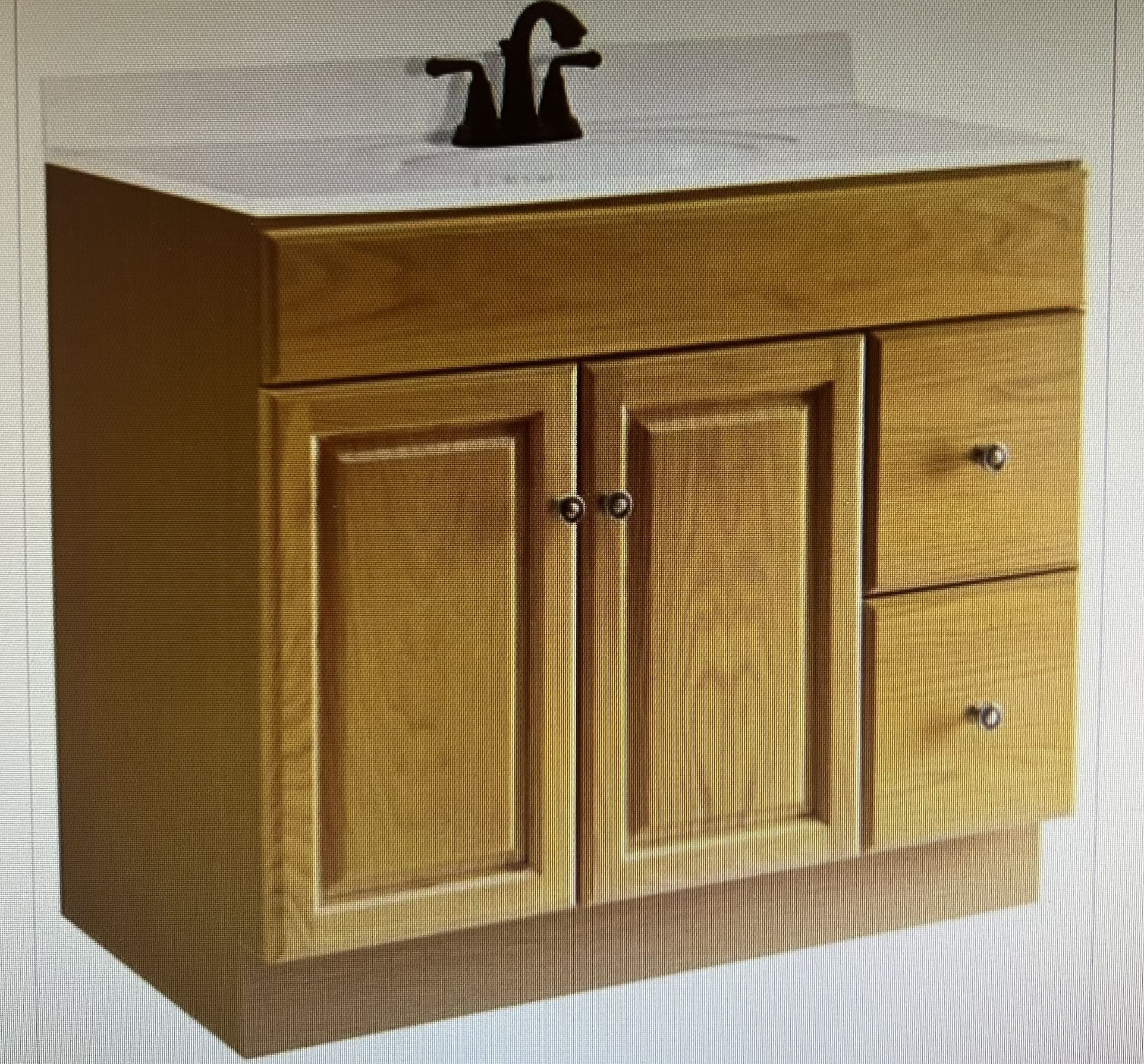 New in box Claremont 31.5×36×21 vanity base cabinet in honey oak by design house. New in box does not come with the top and faucet
