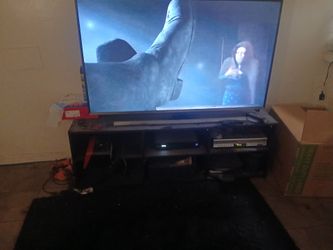 Nice flat screen TV in a nice new couch