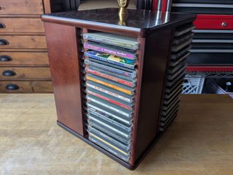 Bombay Company Rotating 64 CD/DVD Dark Wood & Brass Stand with CDs