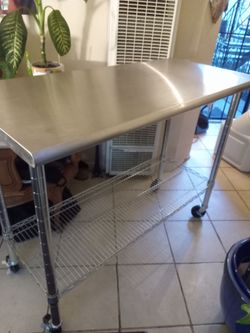 Stainless steel commercial utility table