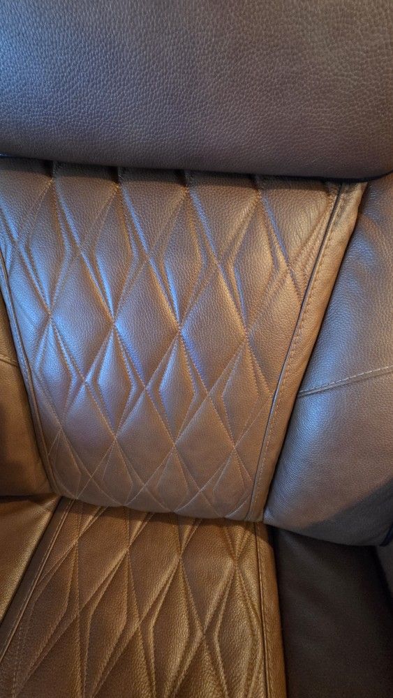 Boyington Dual Power Leather Reclining Sofa