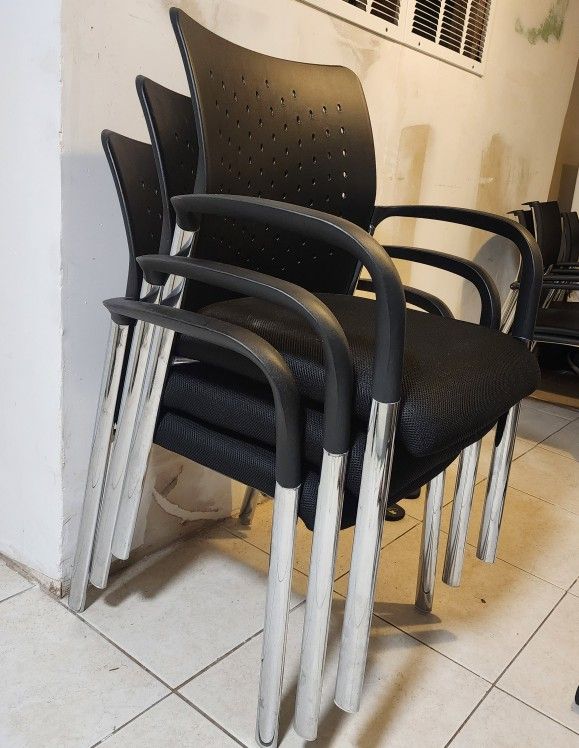 Set of 3 Heavy Duty Stacking Chair, 550 lb. weight capacity, black capped arms.