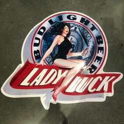 Lady Luck tin sign 36”x32”