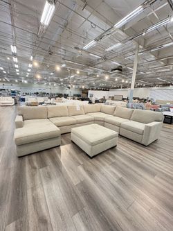 Radley 6pc beige fabric sectional with storage ottoman