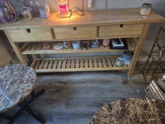 Real wood nice three drawers and two shelves