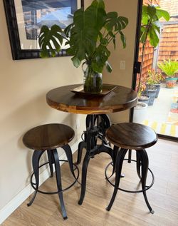 Pub table with three stools
