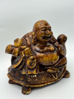 Carved Buddha Figurine on Turtle heavy stone
