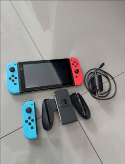 Nintendo Switch Console – Neon Blue & Neon Red Joy-Cons | Excellent Condition 🎮