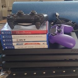 PS4 With Contollers and Games
