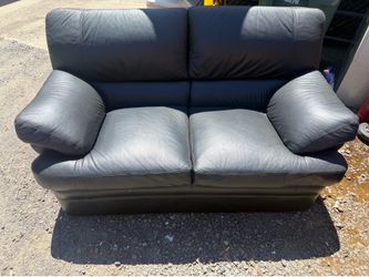 Black leather love seat