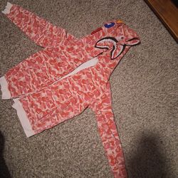 Pink Bape jacket and Nike blue shoes