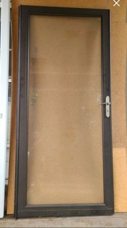 Storm Door . Locking Security Door.  36" x 80" Solid. WITH KEY