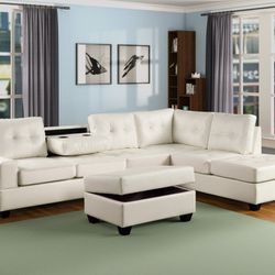 New White Leather Reversible Sectional And Ottoman