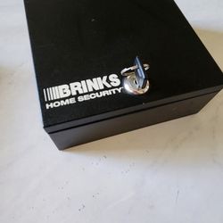 Brinks Home Security black steel metal security box or lock box.