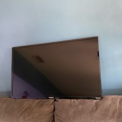 WESTINGHOUSE ROKU TELEVISION FLAT SCREEN 32 INCHES WITH ATTACHED TV MOUNT