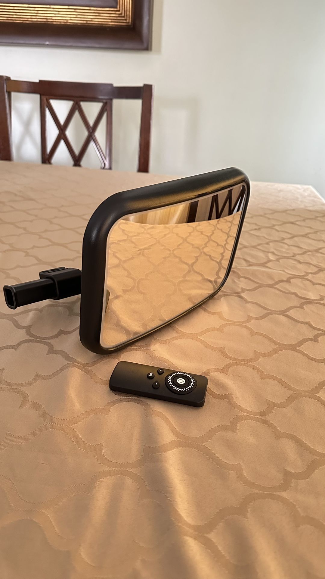 Mirror with light and control to monitor baby in the car