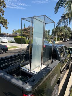 Tall Glass display with glasses and attachments