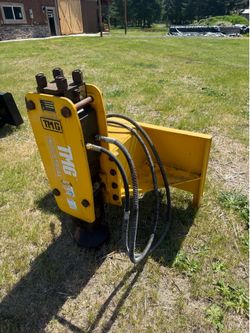 Hydraulic post pounder, post driver, skid steer attachment