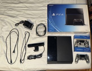 2TB PS4 w/ 2 Controllers, Camera, chargers