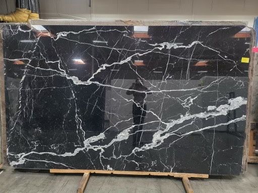Two Nero Marquina marble slabs