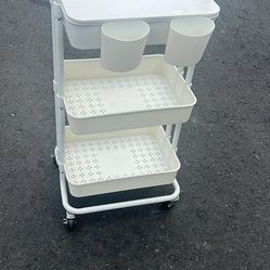 Like new rolling plastic kitchen basket