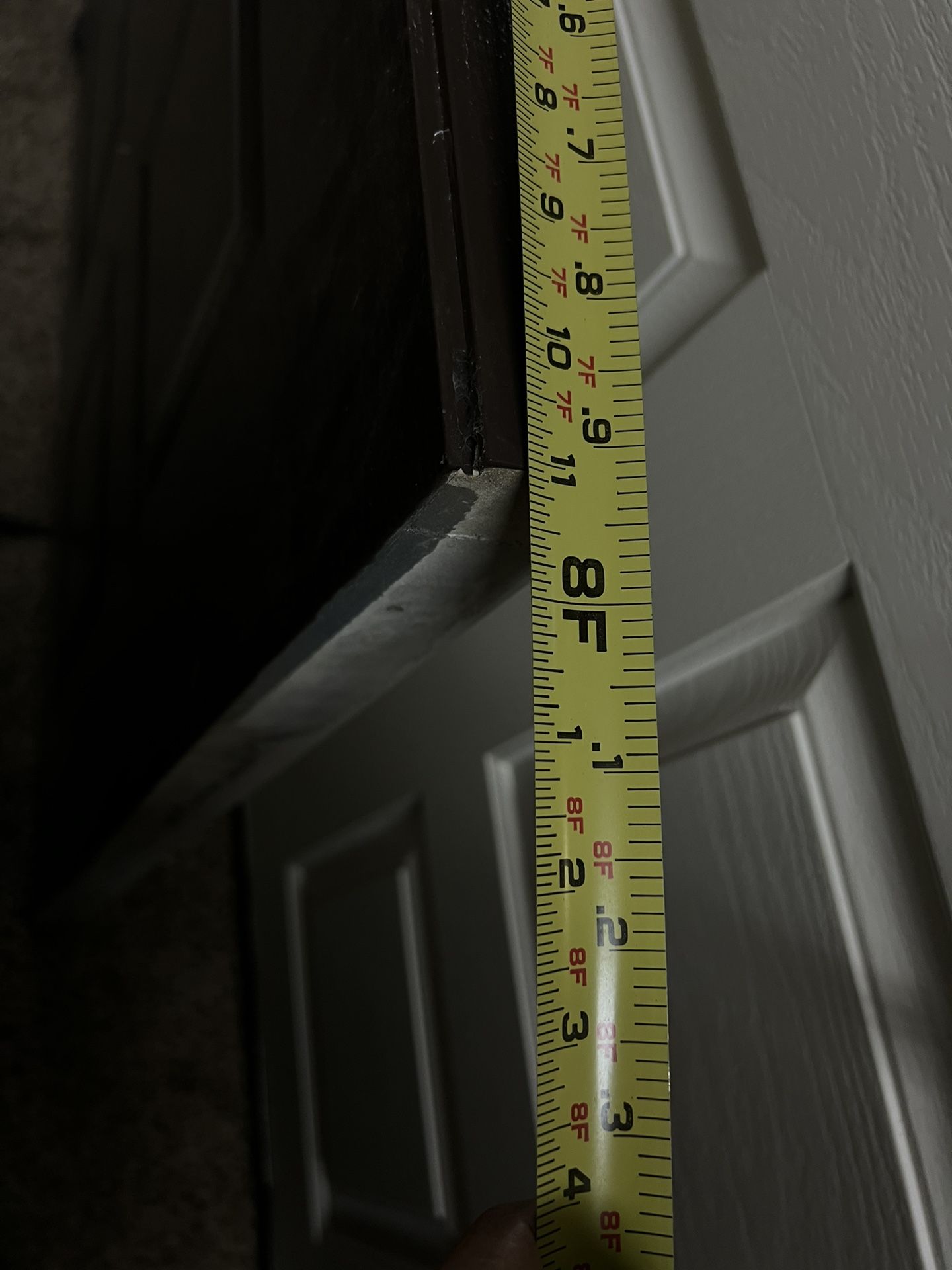 Entry Doors And A Small Chandelier
