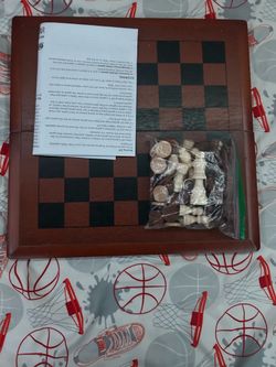 board coach with instructions and all the pieces to all the games it folds up and it’s lightweight Checkers, chess board coach with instructions and a