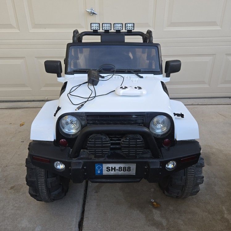 Kid's Ride-On Jeep with Bluetooth Remote