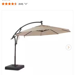 Home Decorators Collection 11 ft. Aluminum and Steel LED Round Offset Outdoor Patio Umbrella in Sunbrella Spectrum Sand