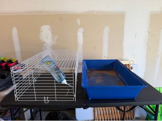 Bunny cage with water bottle