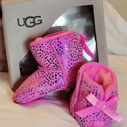 UGG I Jesse Bow II Spots (Toddler 4/5). Color: Pink.