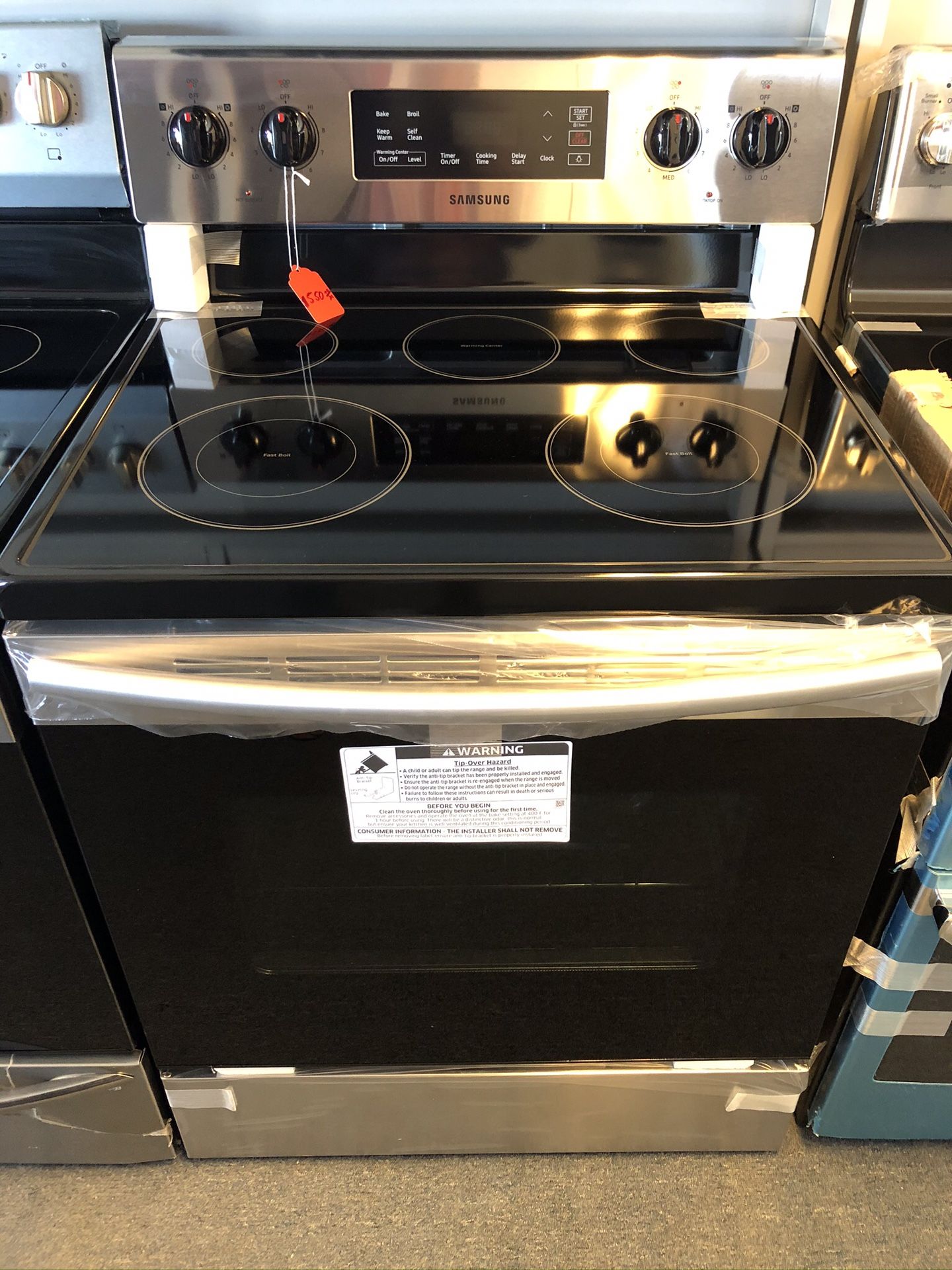 New scratch and dent Samsung 5 burner glass top range. 1 year warranty