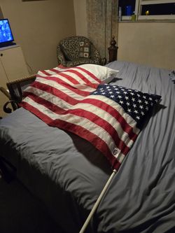 American Flag On Pole . Capped And Handled