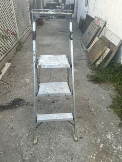 3 Step Aluminum Ladder Has Lots Op Paint Spills On It