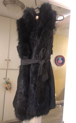 Black shaggy coat/ no sleeves