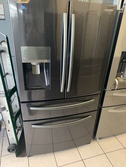 SAMSUNT FOUR DOOR FRIDGE