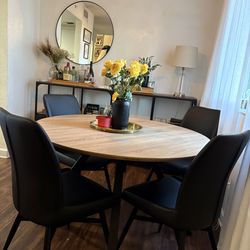 Table with 4 black pu leather chairs