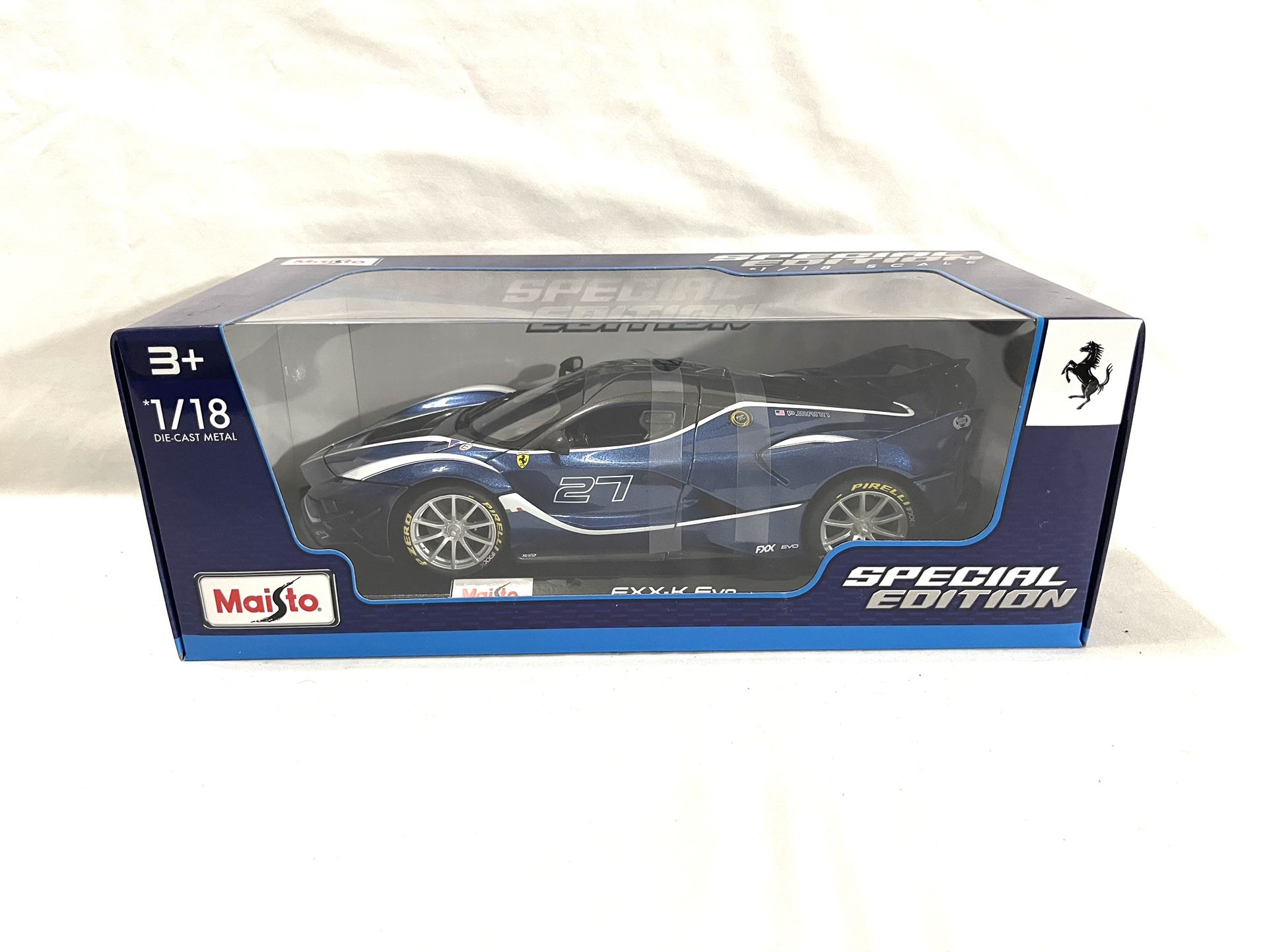 Mint Condition New In Box Scale 1/18 Diacast (Maisto) Ferrari FXXK Evo No. 27 Toy Car. Retails for $50.