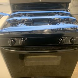 GE 4 Burners Gas Stove In Black Working Perfectly 