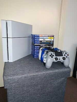Sony Playstation 4 (White) 500 GB + 2 remotes & 10 games. Great Condition