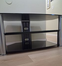Modern Black Glass and Chrome TV Stand
44"w x 25"d x 20"h
The glass is 3/8" thick
