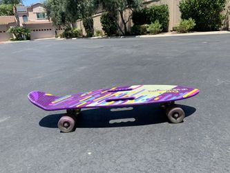 Girls Skateboard And Two Scooters