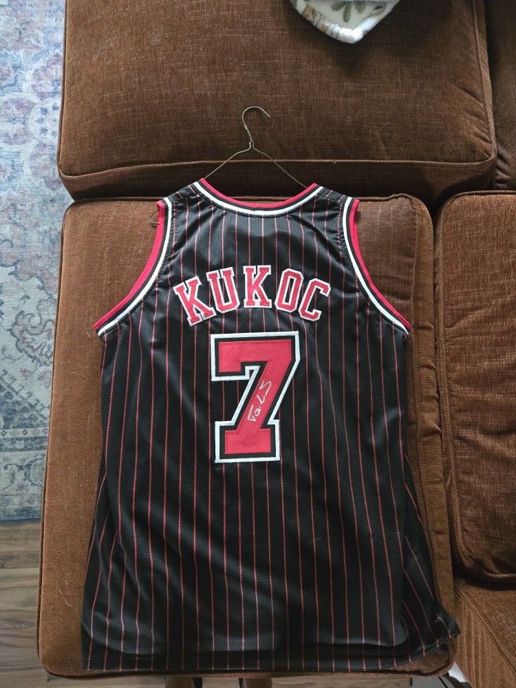 Autographed Tony Kucoc Jersey 