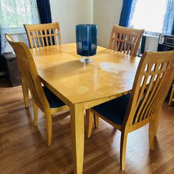 Dining room Table, chairs, And hutch