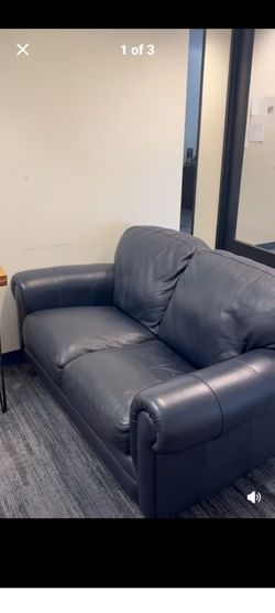 Blue leather loveseat.