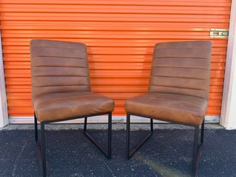 Modern faux leather brown chair set.